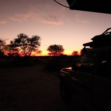 Rondreis Botswana Sunrise at Sunday Pan Kalahari Botswanao